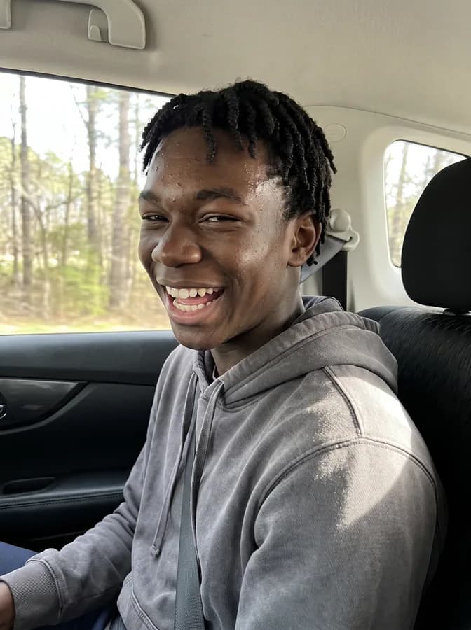 One of the phone photos a parent sent: a fictional basketball player laughing in the car on the way home; photo generated
