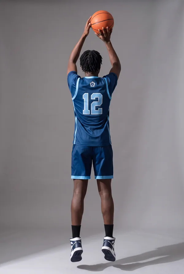 Shot 4 of 4: the same fictional basketball player from behind — the frame the card back is built from