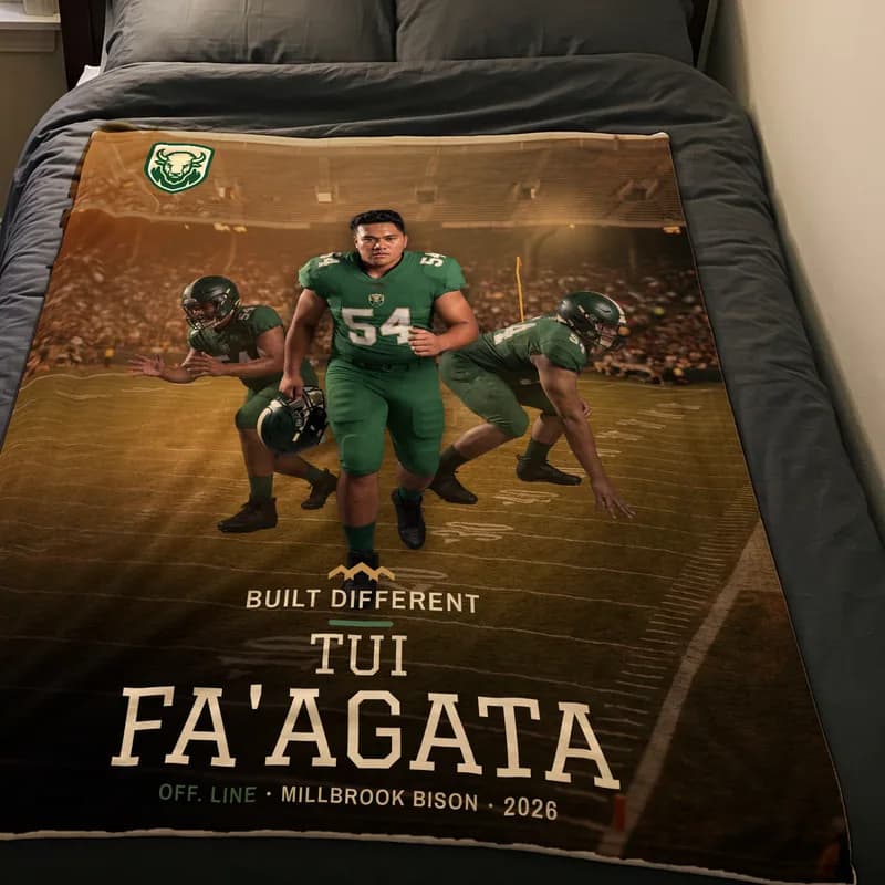 A mockup of a custom plush football blanket lying on a bed, printed with the athlete's poster artwork — Heritage finish — example artwork, fictional roster athlete; generated image, not a photo of a finished blanket